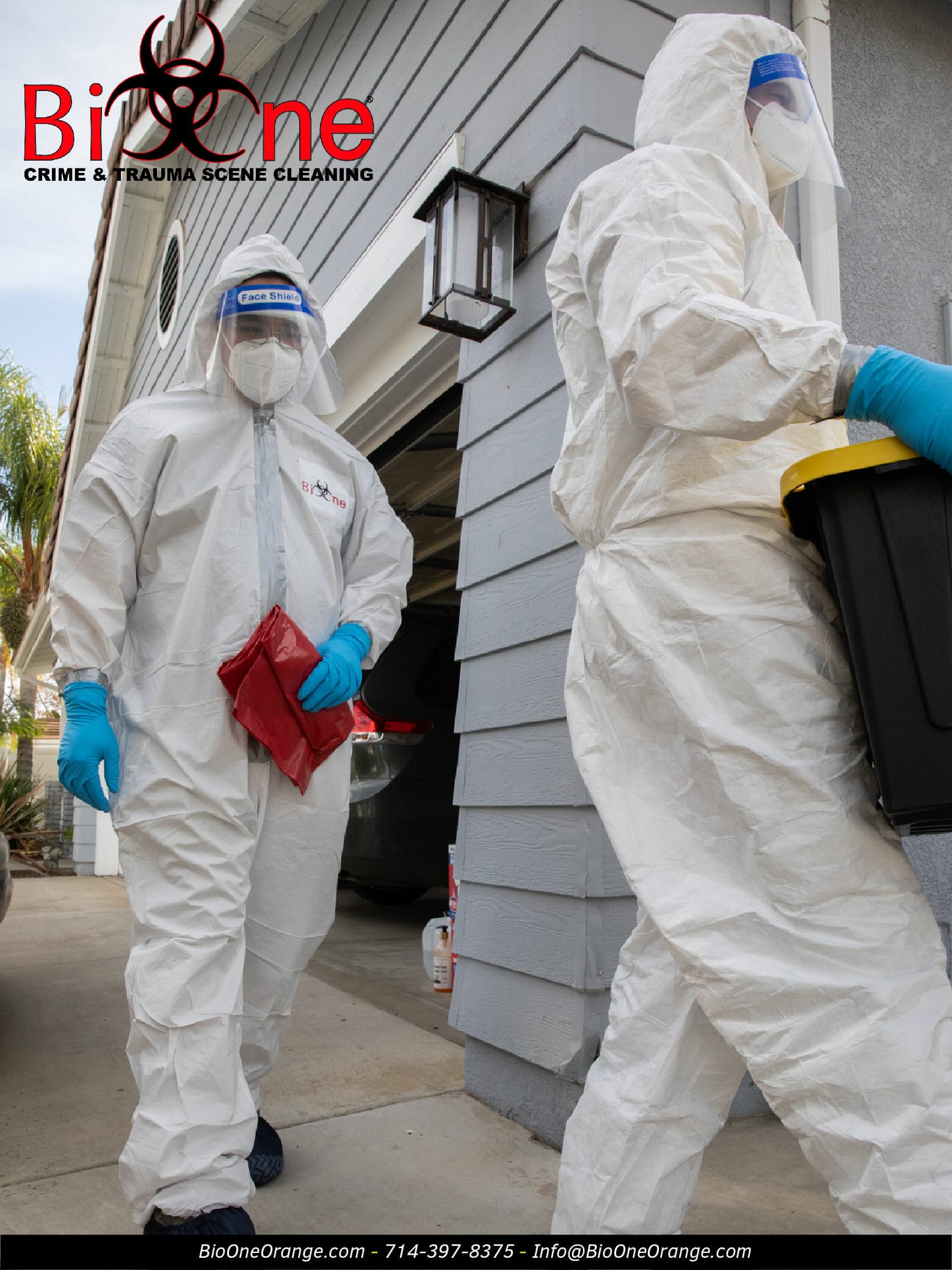 Image shows Bio-One restoration technicians entering a house for a disinfection and decontamination service.