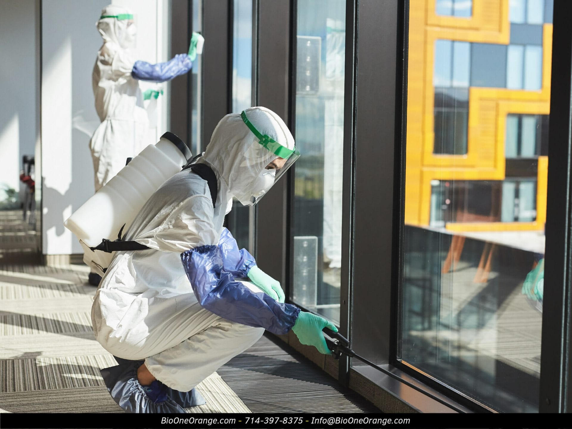 Biohazards technicians disinfecting business. Photo credit: @seventyfour - Freepik.