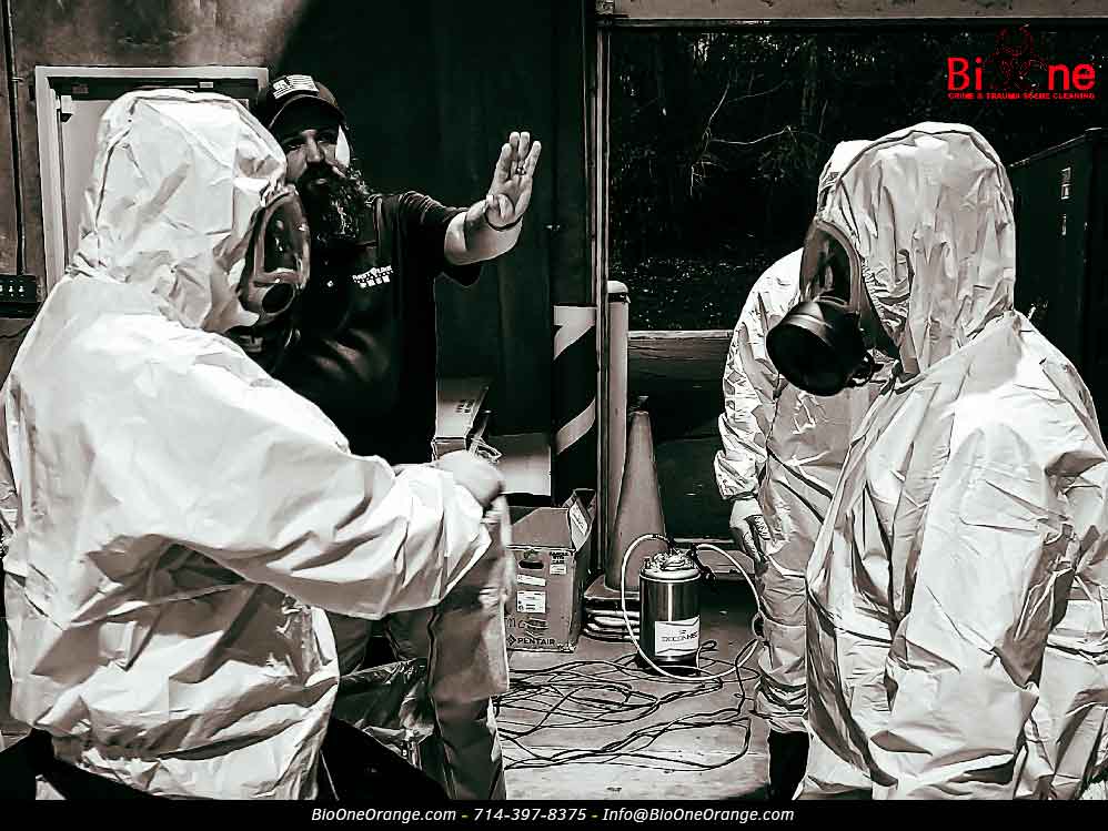 Technicians preparing for tear gas cleanup. Photo credit: Bio-One of Orange.